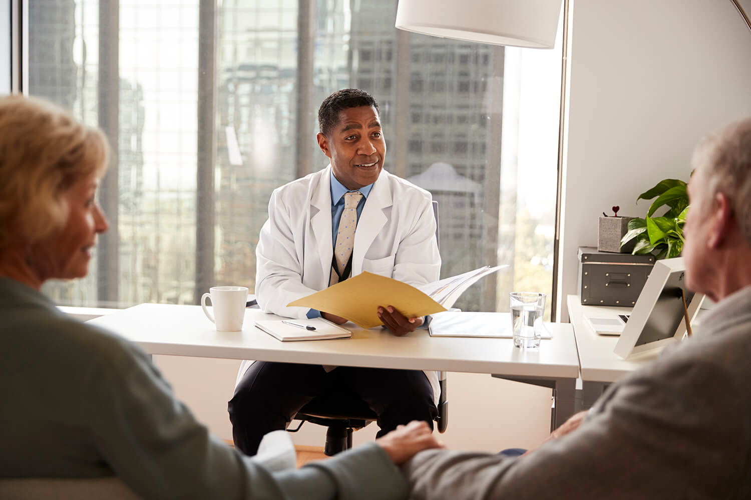 senior-couple-having-consultation-with-male-doctor